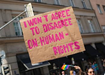 A sign with a message about human rights