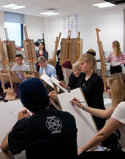Students drawing in the art studio
