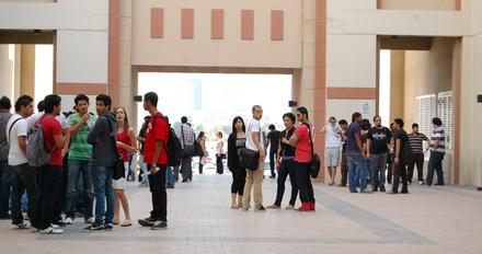 Group of students standing and chatting