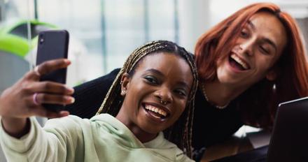 People smiling taking a selfie