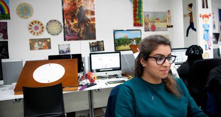 A student working on their animation in the computer room