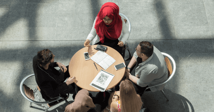 Students working together informally in the Quad