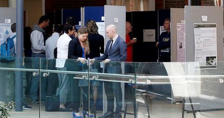 a group of people at an exhibition