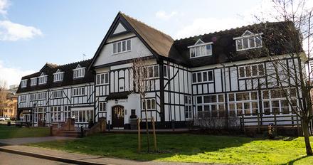 old white building with timbers