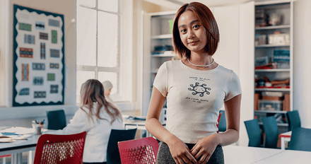 Header of a student in a classroom in College Building