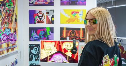 Student stood in front on art gallery