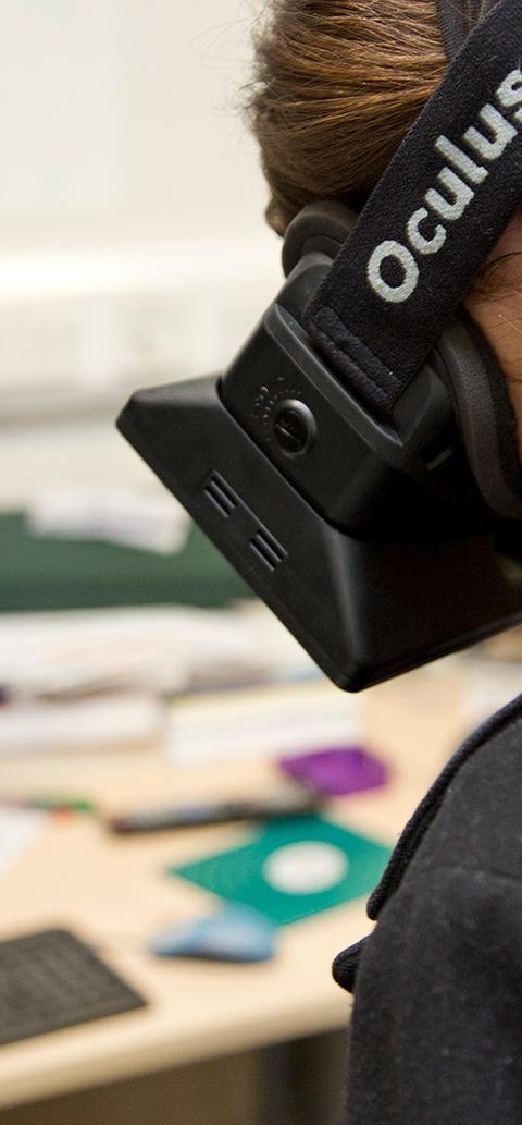 A student with a headset on