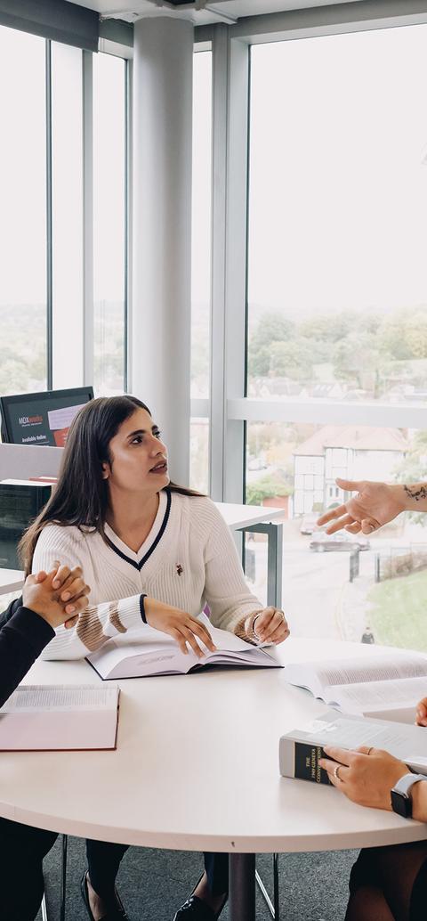 Criminology students in round table discussion