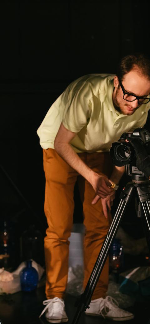 Students behind a camera