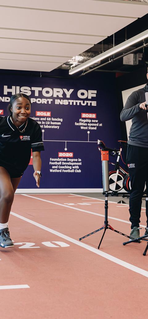 Student training on indoor track