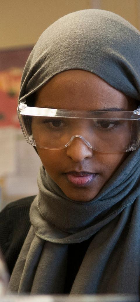 A student with googles thinking
