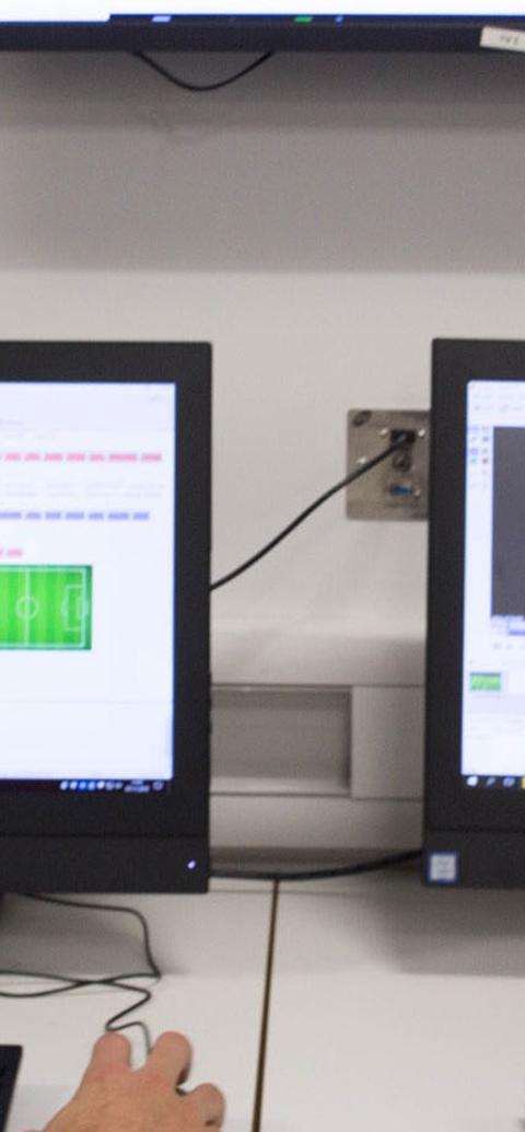 students analysing sports performances on a computer