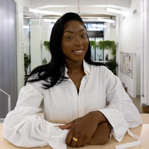 Graduate sitting at table