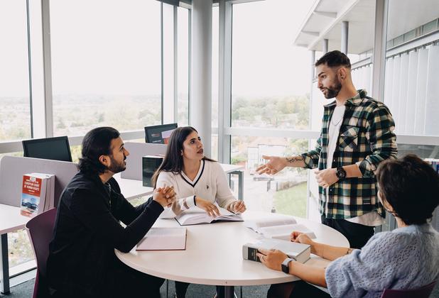 Criminology students in round table discussion