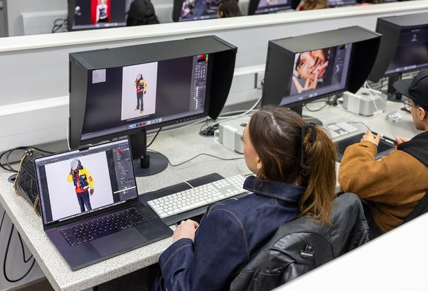 Students editing images on computer