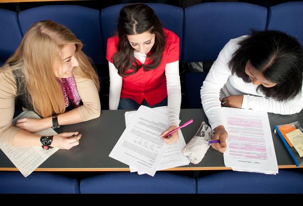 aerial view of three students working