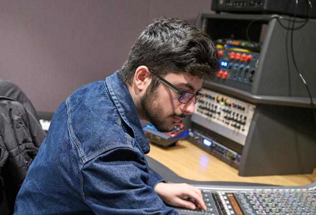 Student using a sound mixer