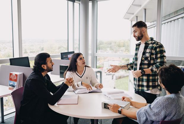 Criminology students in round table discussion