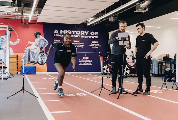 Student training on indoor track