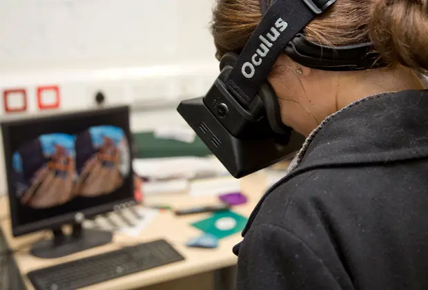 A student with a headset on