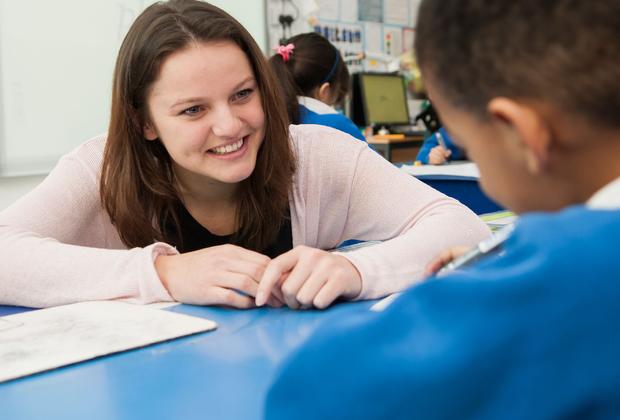 teacher student and child in school