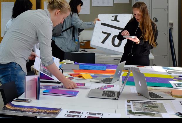 A diverse team collaborating on a project, brainstorming ideas and working together towards a common goal.