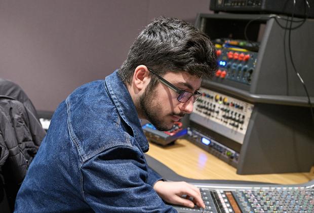 Student using a sound mixer