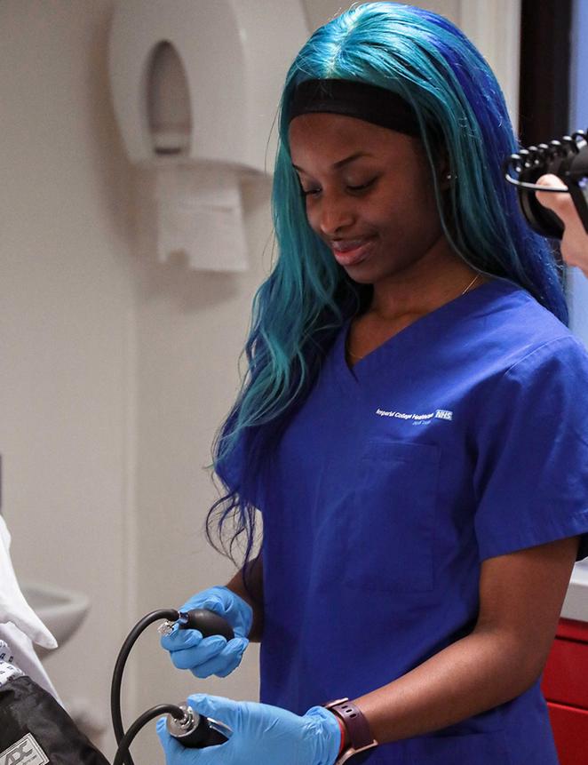 nurse checks device