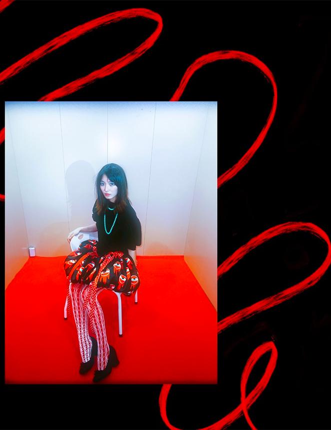 This work by Lin Jiapeng Cecilia showcases a model in red and black clothes to symbolise blurred boundaries between technology and biology