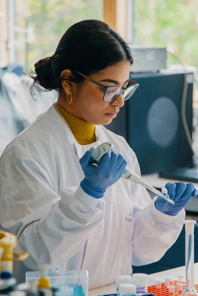 Biosciences student testing in on campus lab