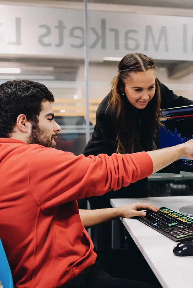 Accounting-finance-economics students look at screen