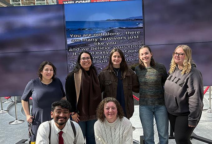 Students involved with Behind Closed Doors Exibition