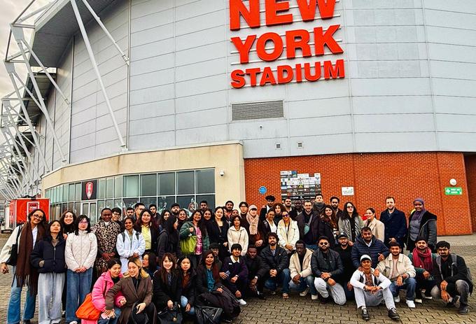 Students stood outside stadium on Sheffield Marketing Trip