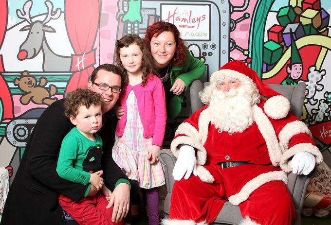 Mia family picture with Santa Claus