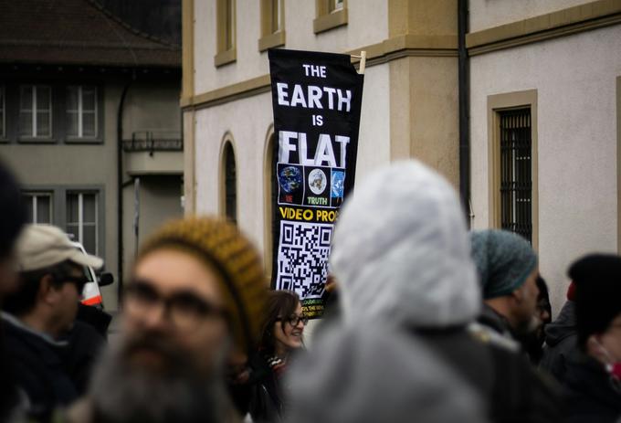 Conspiracy Theories - A banner in the street