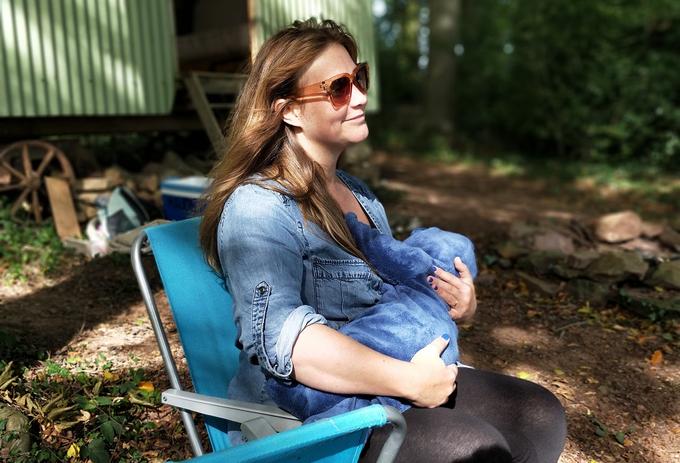 Woman feeding her child