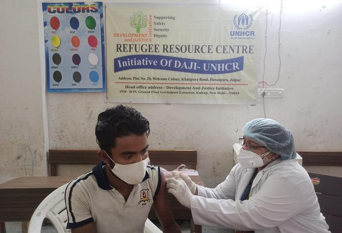 Nurse giving the covid 19 vaccine