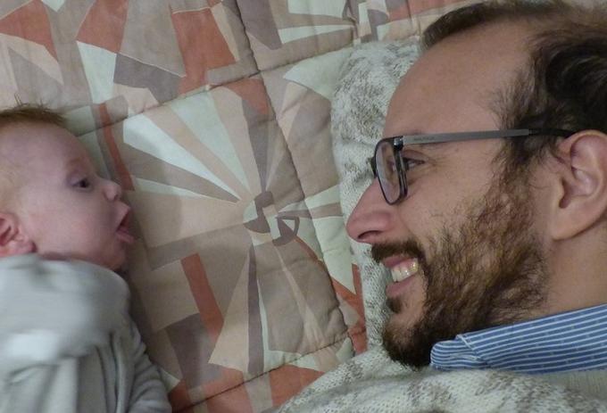 Dad smiling at his baby