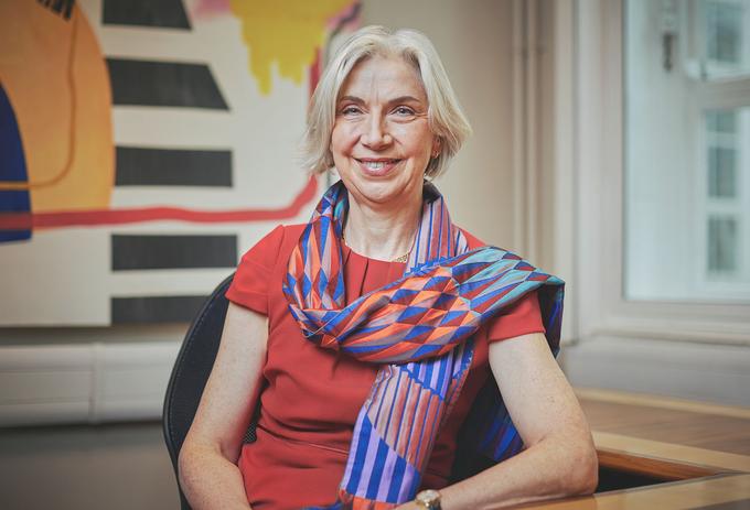 Vice-Chancellor Shan Wareing sitting at a desk