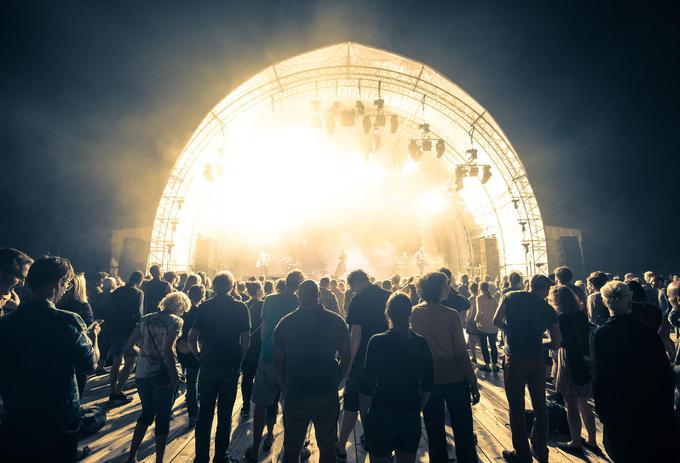 Music festival with a brightly lit up stage