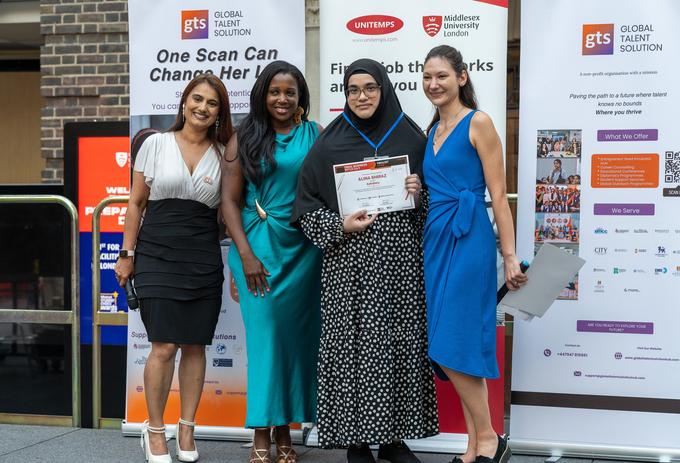 Competition winners standing together