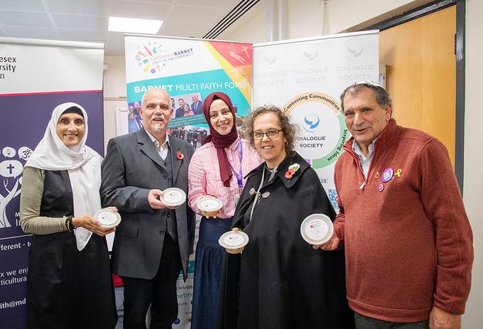 Visitors enjoying Noah's pudding for Inter Faith Week