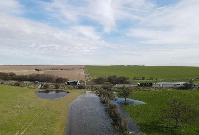 Excess rainwater on agricultural land in West Ilsley, next to the A34