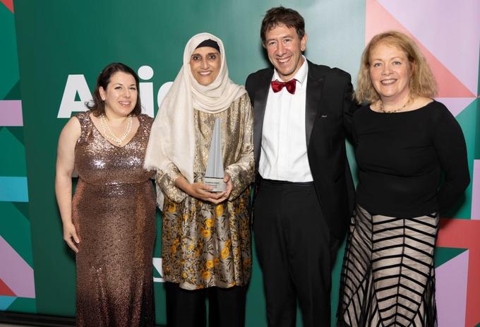 Staff members at awards ceremony