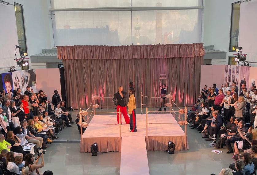 Fashion students on stage at degree show