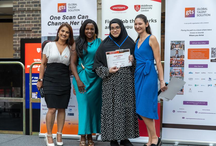 Competition winners standing together