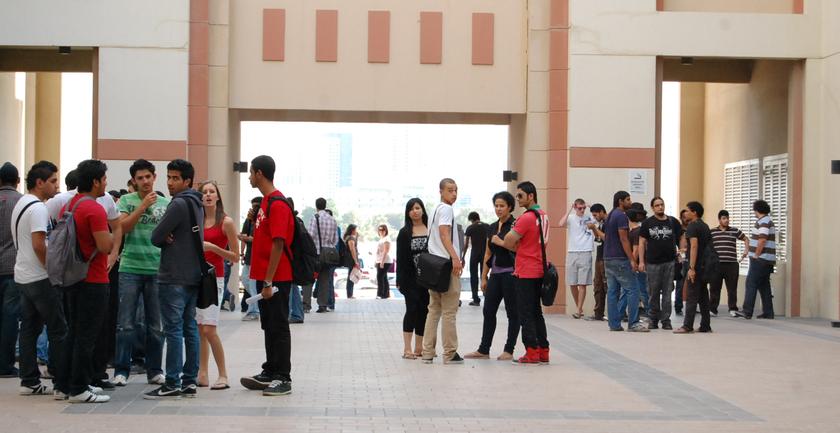 Group of students standing and chatting