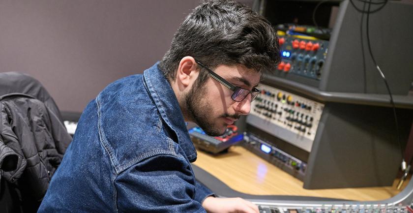 Student using a sound mixer