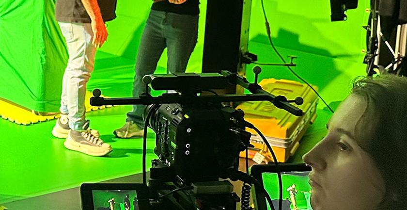 Students filming using green screen technology