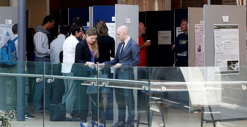 a group of people at an exhibition